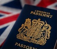 British passport in front of a Union Jack